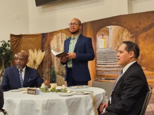 Image of Pastor and Elders conducting a Communion Service