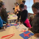 image of children working on a craft project