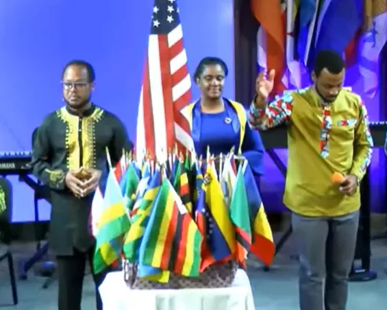 Collection of national flags on the rostrum after the parade of nations.
